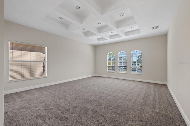 empty room featuring recessed lighting, carpet floors, coffered ceiling, baseboards, and beam ceiling