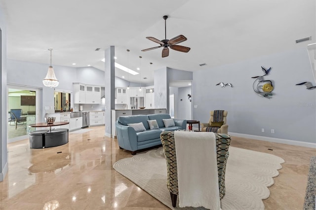 living area with high vaulted ceiling, visible vents, baseboards, and ceiling fan with notable chandelier