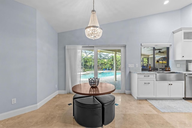 dining area with vaulted ceiling, recessed lighting, and baseboards