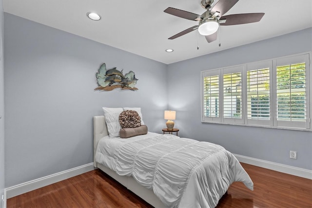 bedroom featuring recessed lighting, baseboards, and wood finished floors