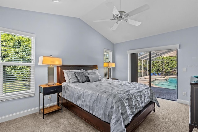 bedroom featuring carpet flooring, a sunroom, baseboards, vaulted ceiling, and access to exterior