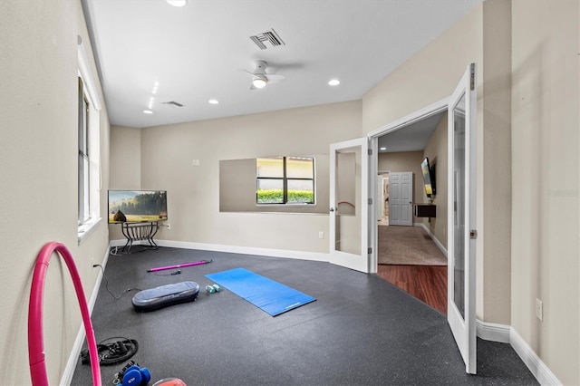 exercise area featuring recessed lighting, visible vents, and baseboards