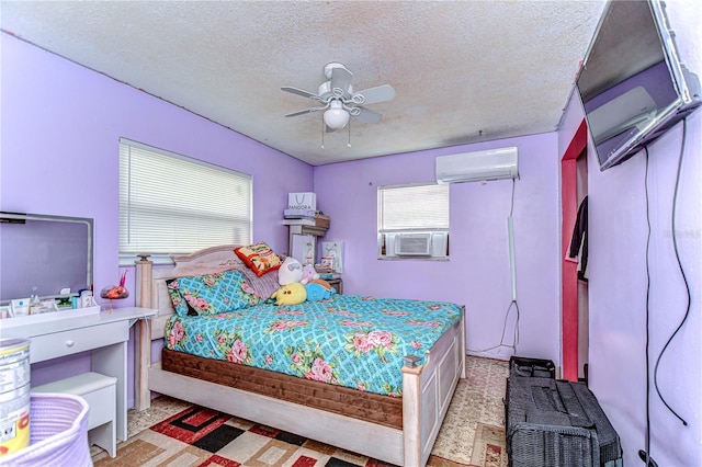 bedroom featuring a textured ceiling, ceiling fan, a wall mounted air conditioner, and cooling unit