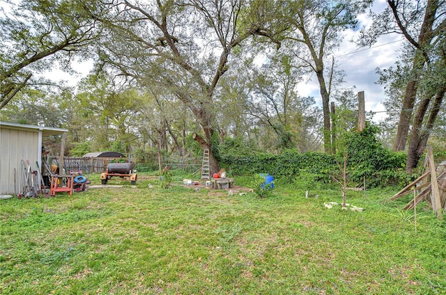 view of yard with fence