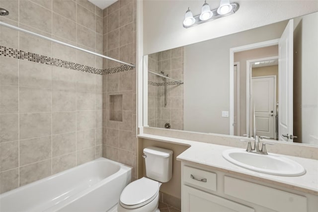 bathroom with toilet, bathtub / shower combination, and vanity