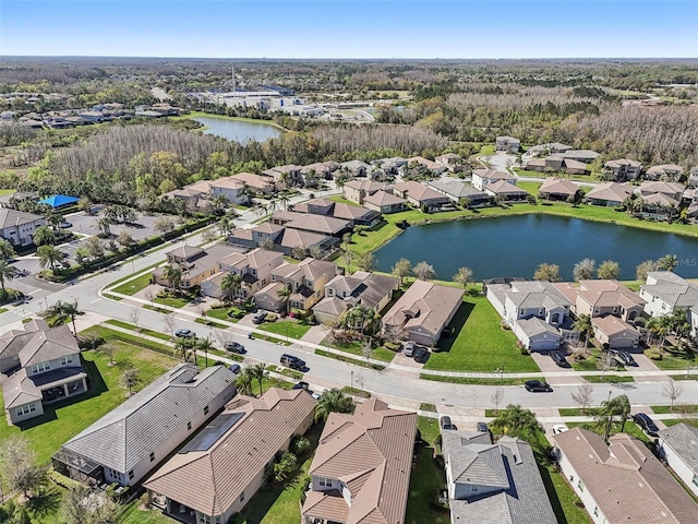 bird's eye view with a water view and a residential view