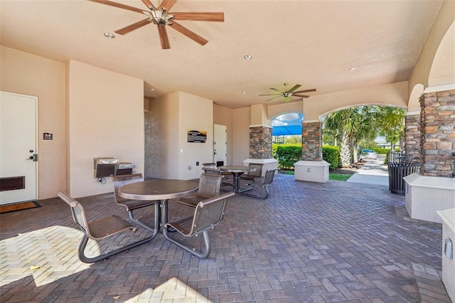 view of patio / terrace featuring ceiling fan and outdoor dining area