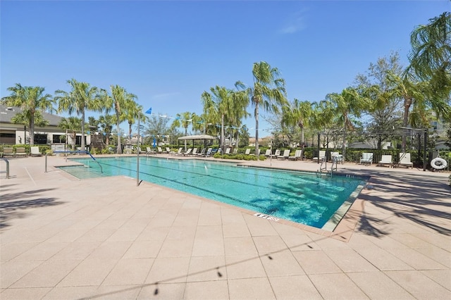 community pool featuring a patio area