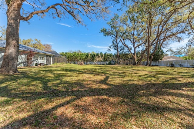 view of yard featuring a fenced backyard