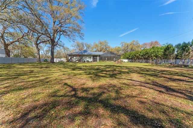 view of yard with fence