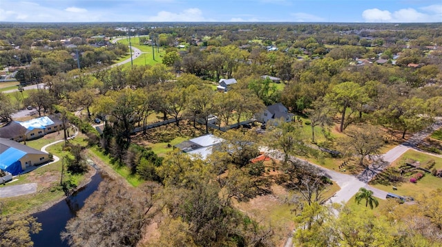 aerial view with a wooded view