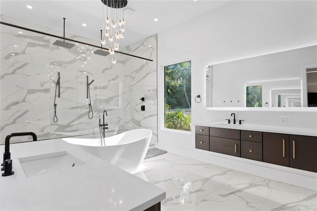 bathroom with recessed lighting, a marble finish shower, marble finish floor, and vanity