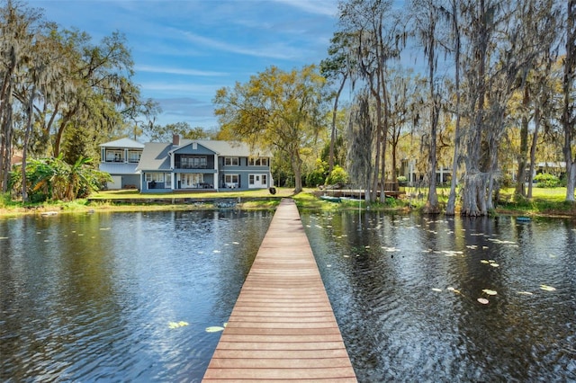 view of dock with a water view