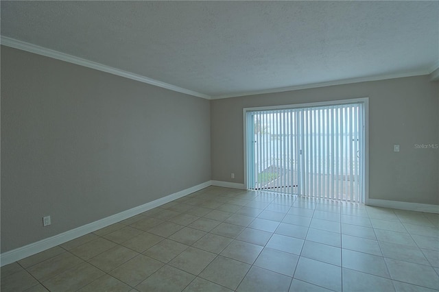 empty room featuring light tile patterned floors, baseboards, ornamental molding, and a textured ceiling