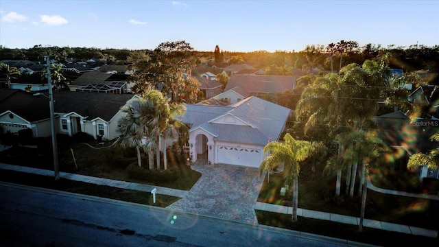 birds eye view of property with a residential view