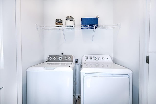 laundry room with laundry area and separate washer and dryer