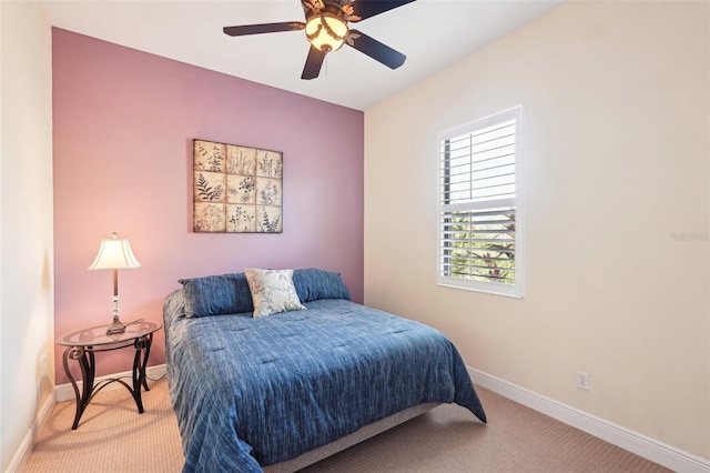 bedroom featuring carpet flooring, baseboards, and ceiling fan