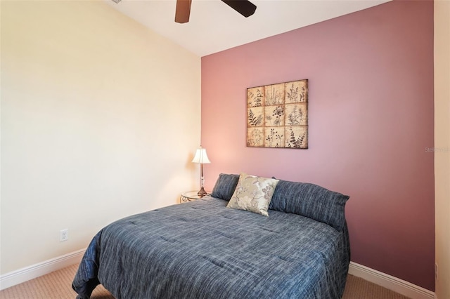 bedroom featuring carpet, baseboards, and ceiling fan