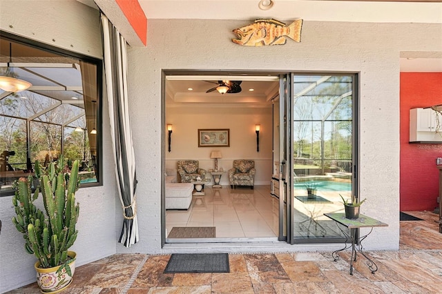 property entrance featuring stucco siding