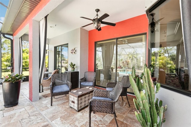 view of patio / terrace featuring ceiling fan