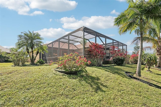 view of yard featuring glass enclosure