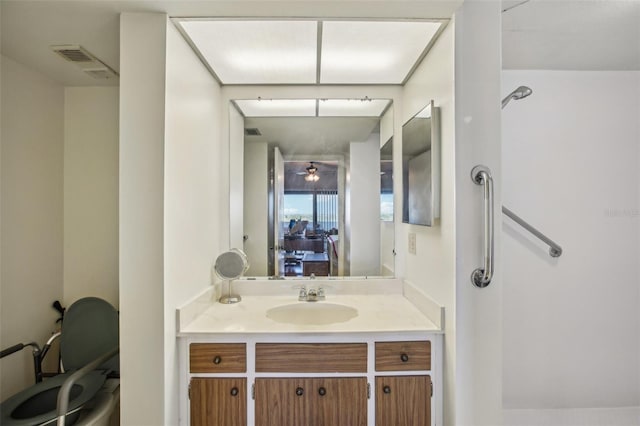 bathroom with vanity and visible vents