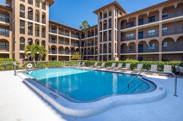 community pool with fence