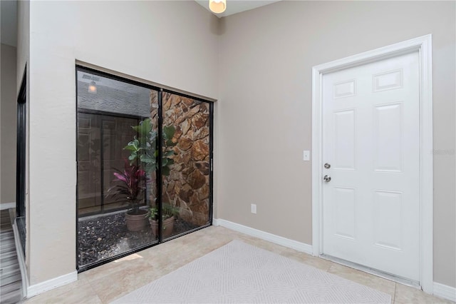 14501 Brambie Ct, Tampa, FL 33624 - interior space with baseboards and tile patterned flooring