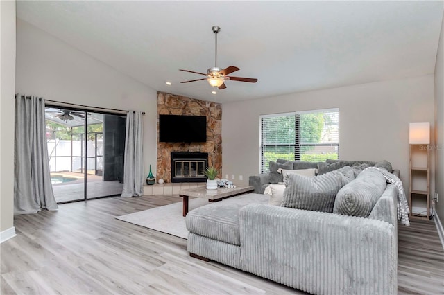 14501 Brambie Ct, Tampa, FL 33624 - living room featuring wood finished floors, a healthy amount of sunlight, and a ceiling fan