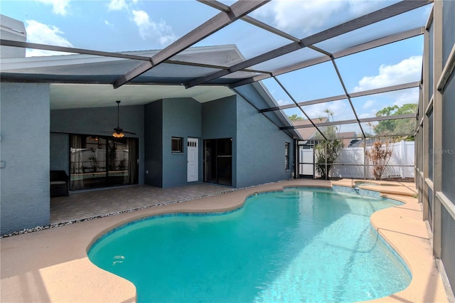 14501 Brambie Ct, Tampa, FL 33624 - view of pool featuring a ceiling fan, glass enclosure, and a patio
