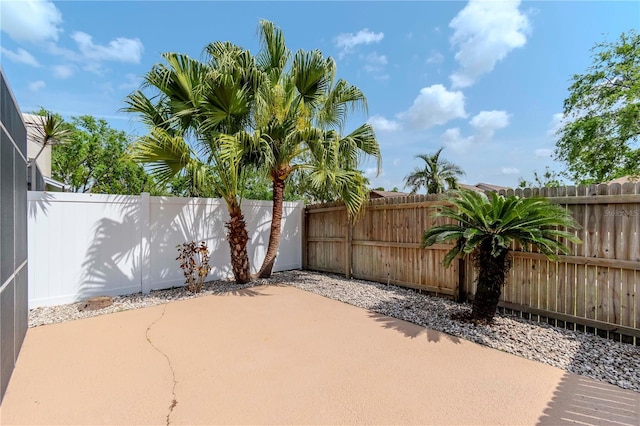 14501 Brambie Ct, Tampa, FL 33624 - view of patio with a fenced backyard