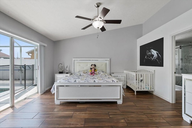 unfurnished bedroom with vaulted ceiling, access to outside, dark wood-type flooring, and baseboards