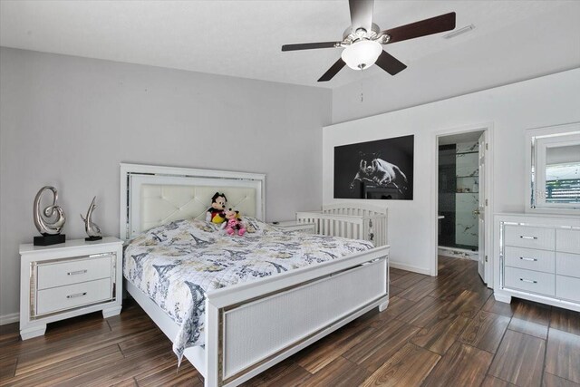 bedroom featuring dark wood-type flooring, visible vents, ceiling fan, and baseboards