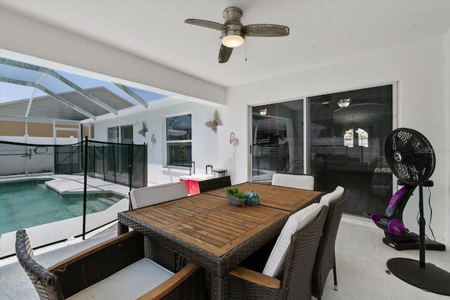 view of patio / terrace featuring a fenced in pool, a lanai, and ceiling fan