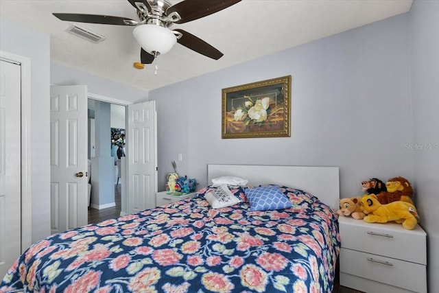 bedroom with visible vents and ceiling fan