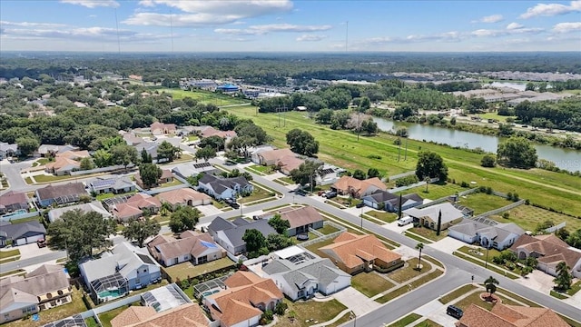 aerial view featuring a water view and a residential view