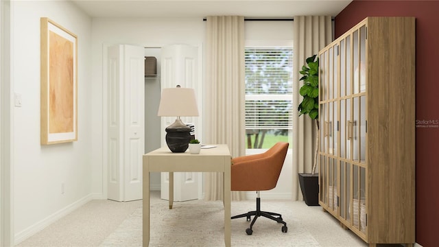 home office featuring baseboards and carpet flooring