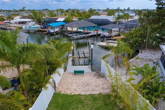 exterior space with a water view and a residential view