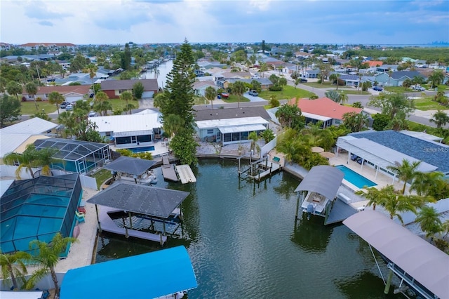 aerial view featuring a residential view and a water view