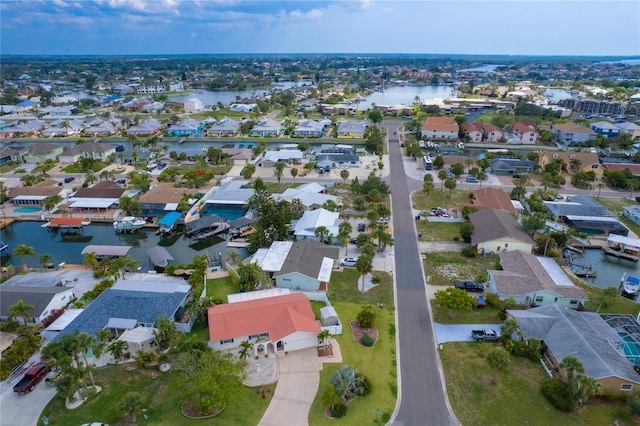 aerial view with a residential view and a water view