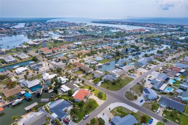 aerial view with a residential view and a water view