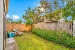 view of yard featuring a fenced backyard