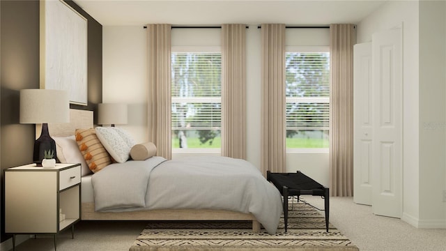 bedroom with light colored carpet