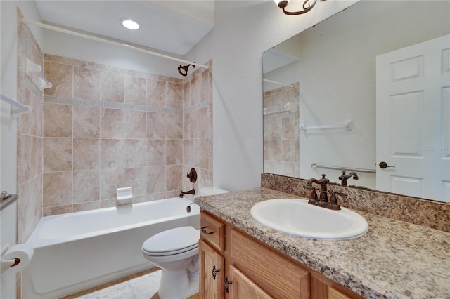 full bath featuring bathing tub / shower combination, vanity, and toilet