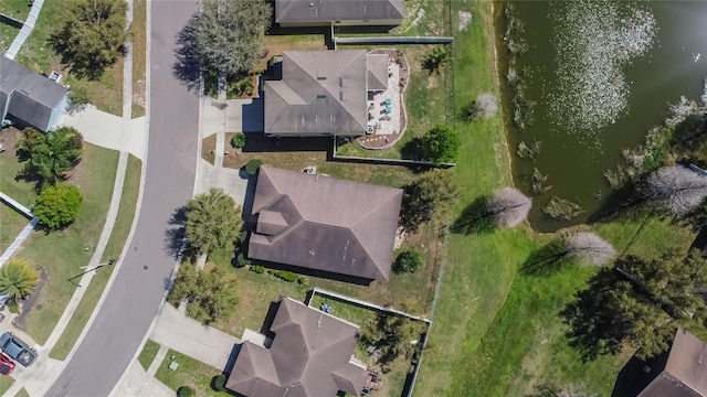 drone / aerial view with a water view