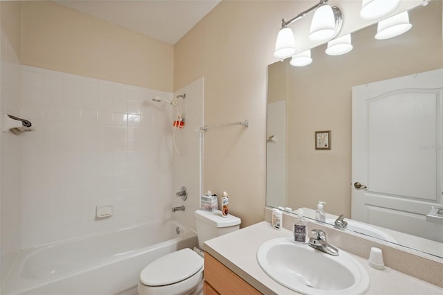 full bath featuring toilet, vanity, and washtub / shower combination