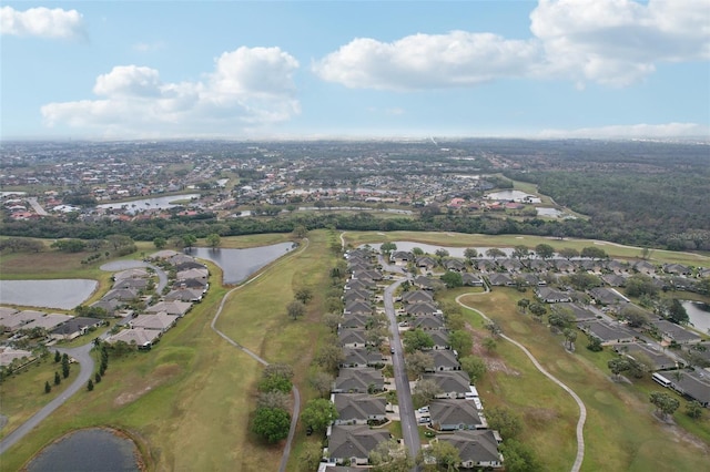 birds eye view of property with a residential view and a water view