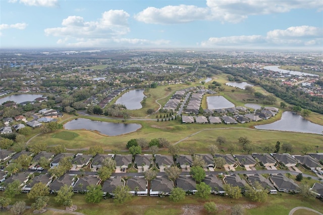 birds eye view of property featuring a residential view and a water view