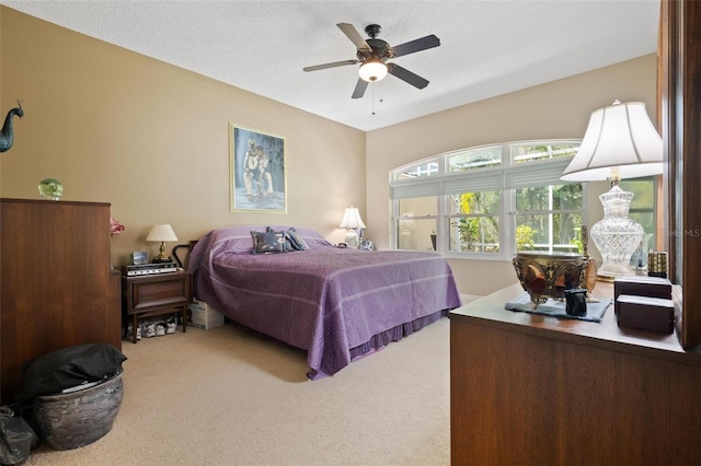 3798 Darston St, Palm Harbor, FL 34685 - carpeted bedroom featuring a textured ceiling and a ceiling fan