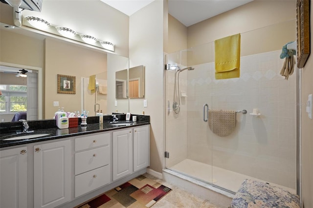 3798 Darston St, Palm Harbor, FL 34685 - bathroom with double vanity, a stall shower, tile patterned flooring, and a sink